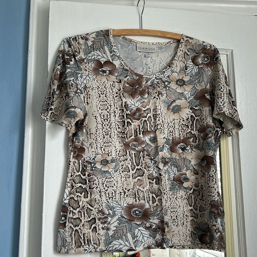 Nice tee shirt -animal print & flower. Made in Germany. Like New